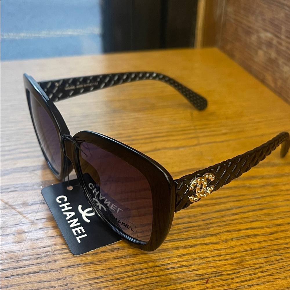 CHANEL Black Sunglasses with Gold Accents